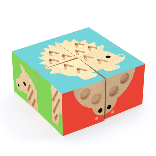 4つのピースからなるキューブパズルです。キューブの面には動物の絵と、絵柄に合わせた模様が彫刻されています。